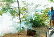 Kent Mountford fires his small salute cannon, sending part of Kenneth Gosner’s remains out into Chesapeake Bay. 