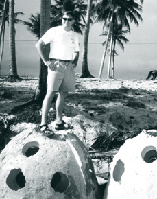 man standing on artificial reef ball